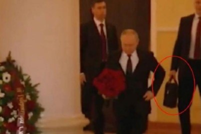 فيديو | "الحقيبة النووية" الروسية لا تفارق بوتين.. اصطحبها معه أثناء مراسم عزاء في كنيسة